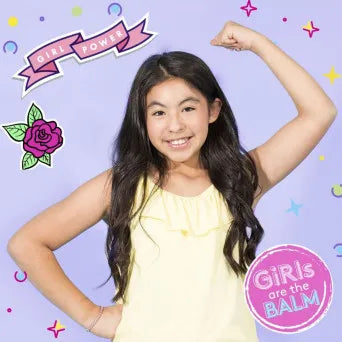 Young girl flexing her arm with 'Girl Power' and 'GiRls are the BALM' graphics on a purple background